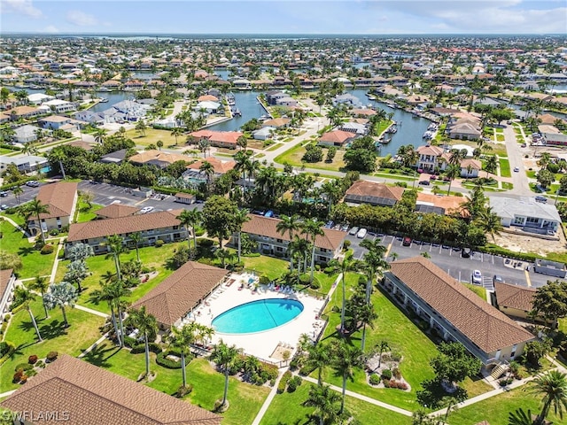 bird's eye view with a water view