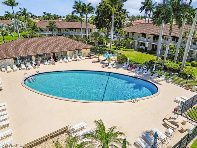 view of swimming pool featuring a patio area