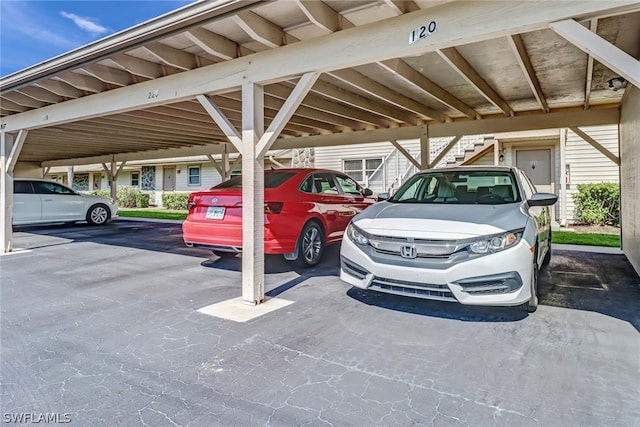 view of car parking featuring a carport