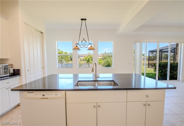 kitchen featuring a center island, white cabinetry, white dishwasher, sink, and light tile floors