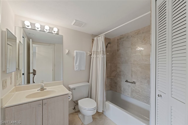 full bathroom featuring tile patterned floors, vanity, shower / tub combo, and toilet