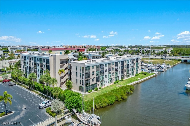 birds eye view of property featuring a water view