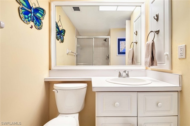 bathroom with oversized vanity and toilet