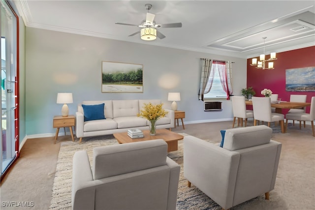 carpeted living room featuring ceiling fan with notable chandelier