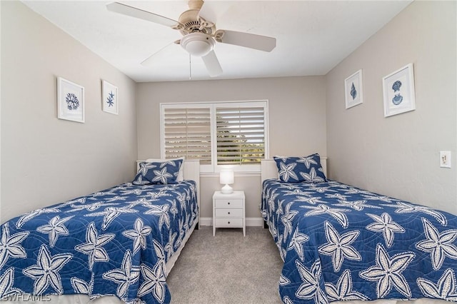 bedroom with ceiling fan and carpet