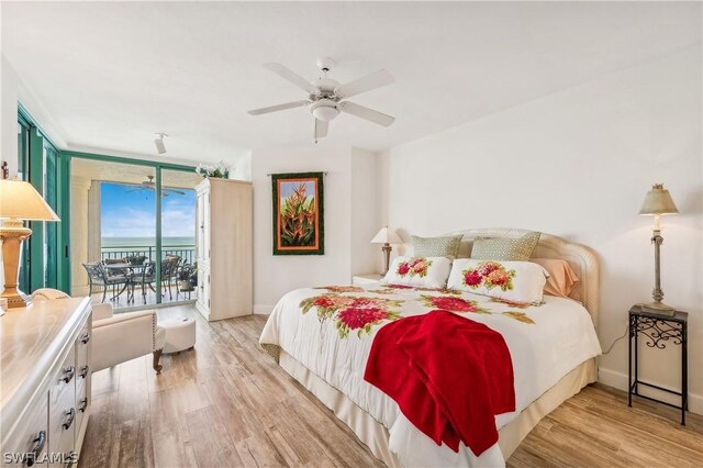 bedroom with ceiling fan, light hardwood / wood-style floors, and access to outside