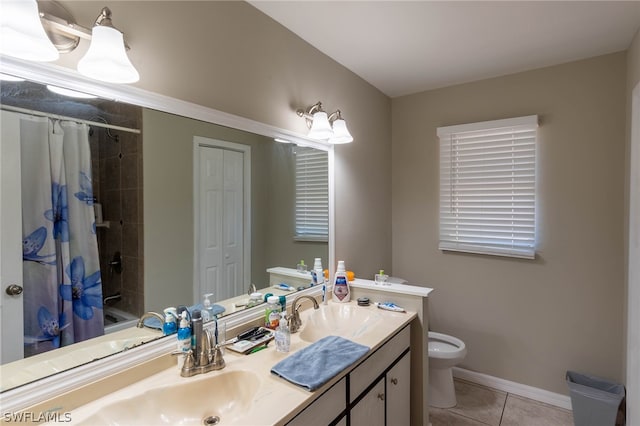 full bathroom with vanity, toilet, tile patterned floors, and shower / bath combo with shower curtain