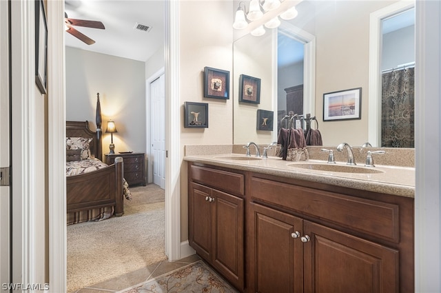 bathroom with vanity and ceiling fan