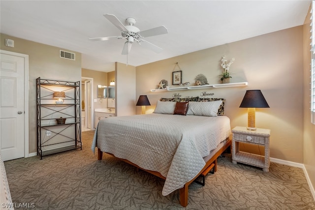 bedroom featuring connected bathroom, ceiling fan, and carpet floors