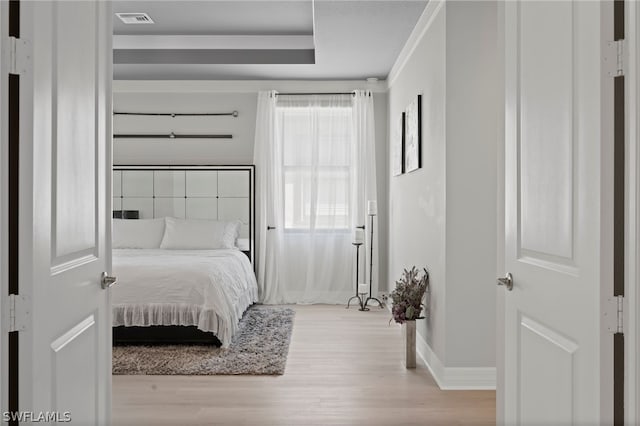 bedroom with light hardwood / wood-style flooring