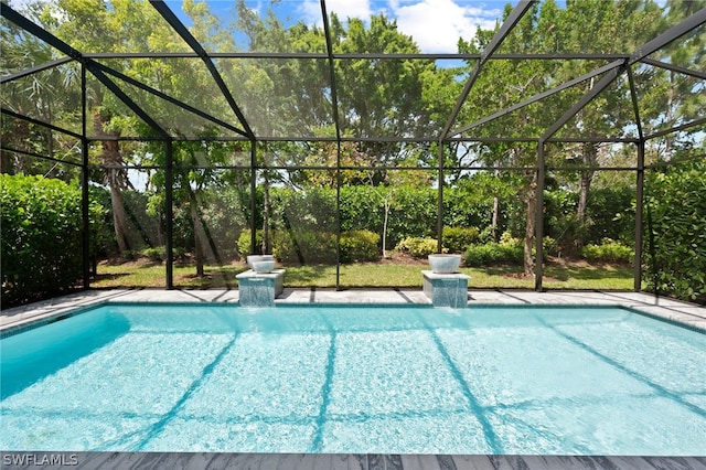 view of pool featuring a lanai