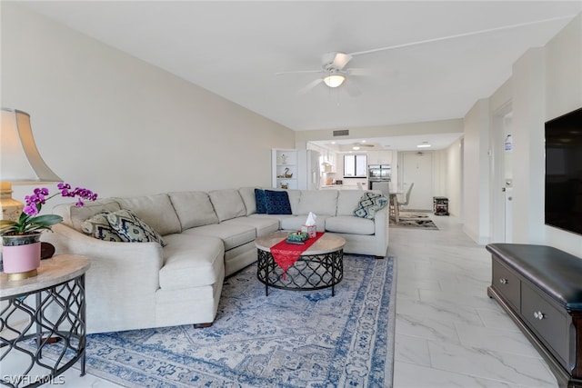 living room featuring ceiling fan