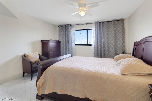 bedroom featuring ceiling fan