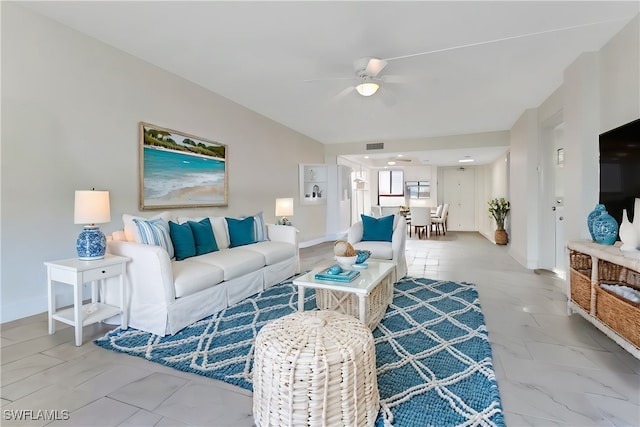 living room featuring ceiling fan