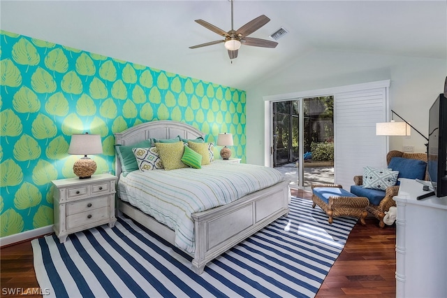 bedroom featuring vaulted ceiling, dark hardwood / wood-style flooring, ceiling fan, and access to exterior