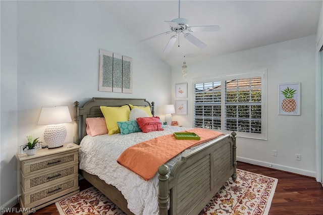 bedroom with dark wood-type flooring, ceiling fan, and vaulted ceiling