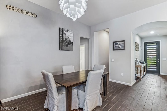 dining room featuring a chandelier