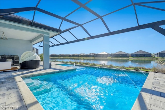 view of pool with glass enclosure and pool water feature