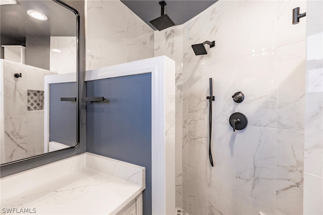 bathroom featuring tiled shower