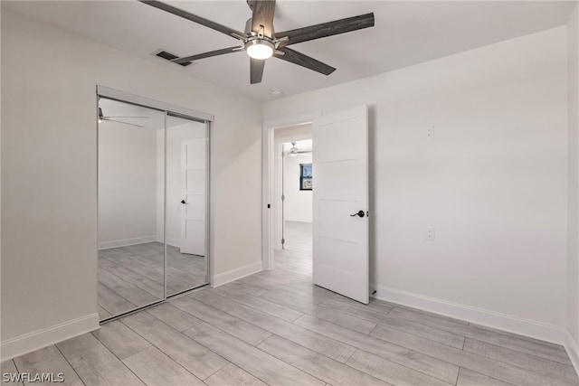 unfurnished bedroom featuring a closet, ceiling fan, and light hardwood / wood-style floors