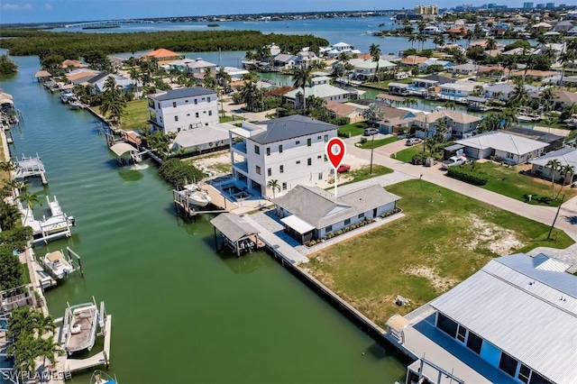 aerial view featuring a water view