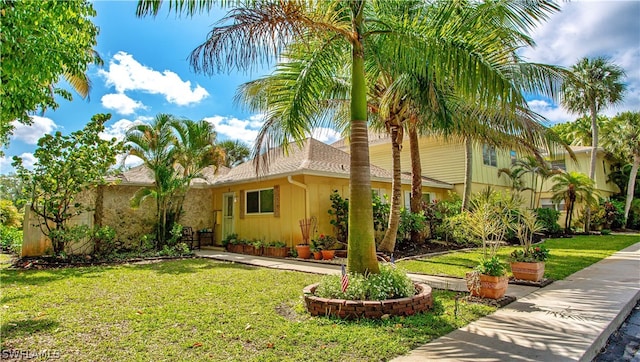 exterior space featuring a front yard