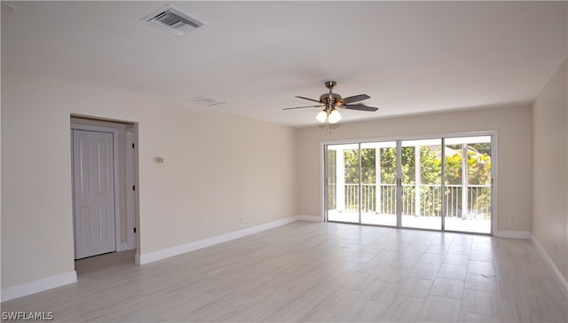 empty room featuring ceiling fan