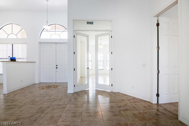 entryway featuring tile patterned flooring