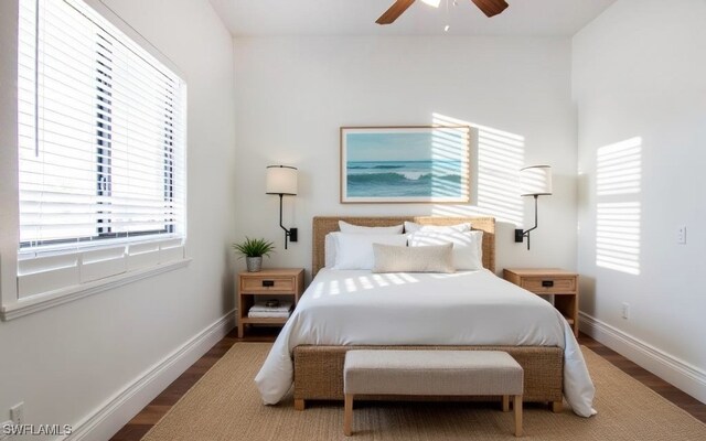 bedroom with ceiling fan and wood-type flooring