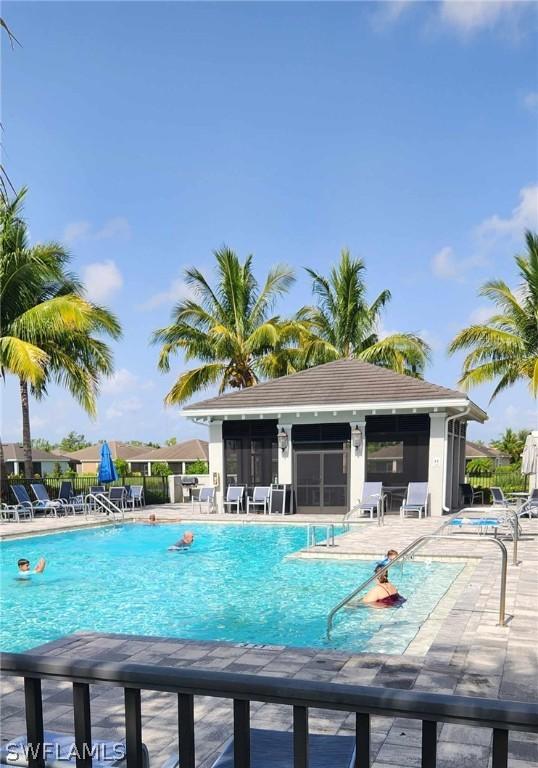 view of pool featuring a patio