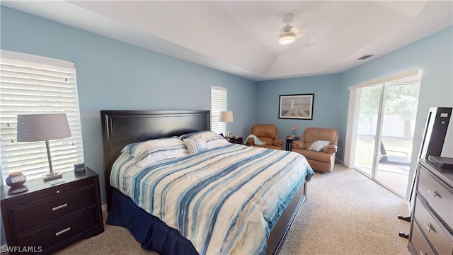 carpeted bedroom with access to outside and ceiling fan