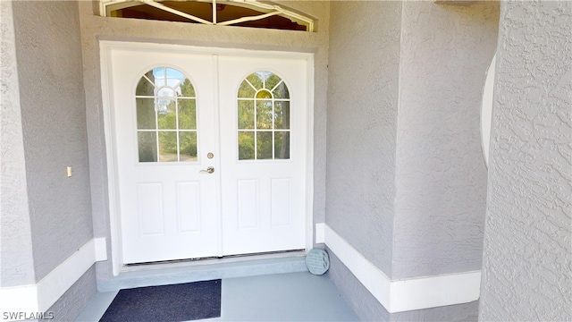 view of exterior entry with french doors