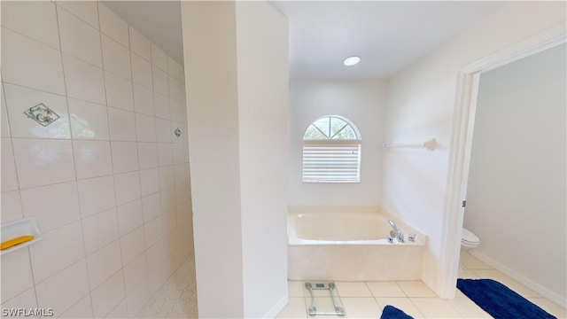 bathroom with separate shower and tub, toilet, and tile patterned floors