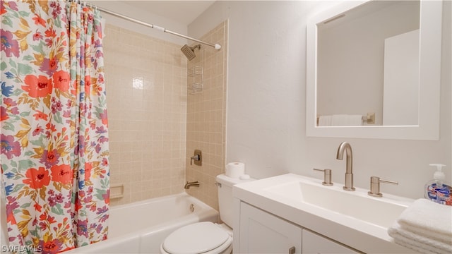 full bathroom with shower / bath combination with curtain, toilet, and vanity