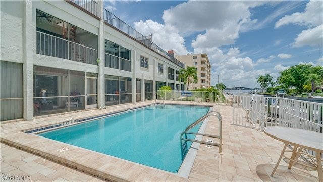 view of pool featuring a patio area