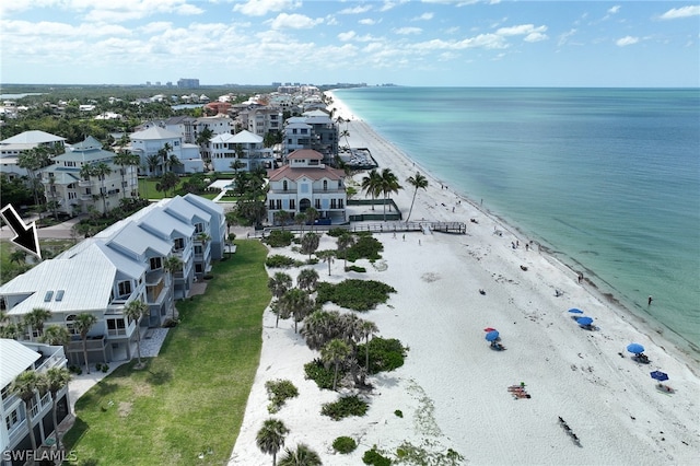 aerial view with a beach view and a water view