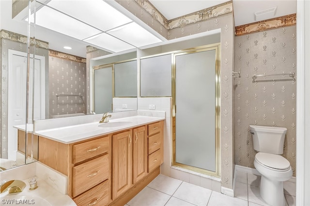 bathroom with tile patterned flooring, toilet, an enclosed shower, and vanity