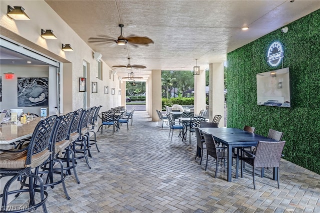 view of patio with ceiling fan