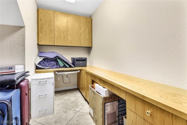 washroom with light tile patterned floors