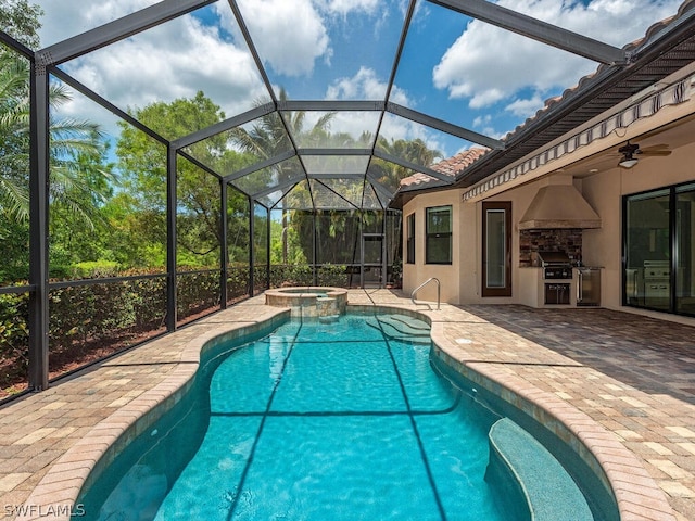 view of swimming pool featuring an in ground hot tub, a patio, a lanai, grilling area, and ceiling fan