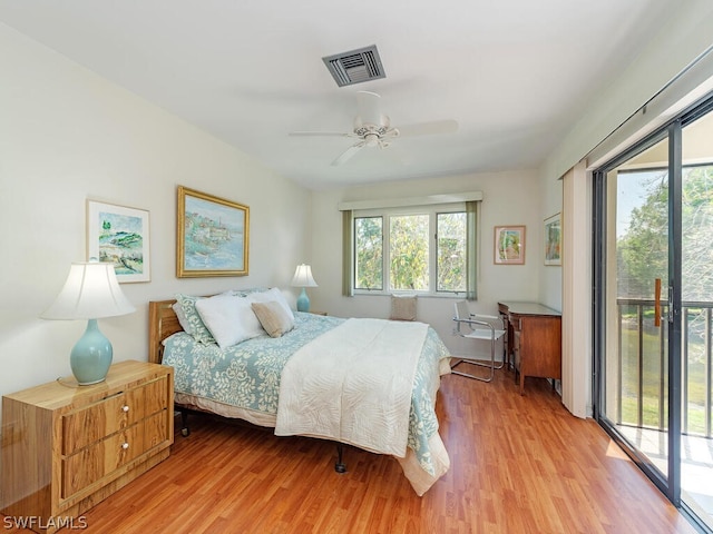 bedroom with light hardwood / wood-style flooring, ceiling fan, access to outside, and multiple windows