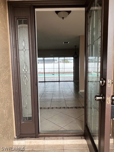 hall featuring tile floors