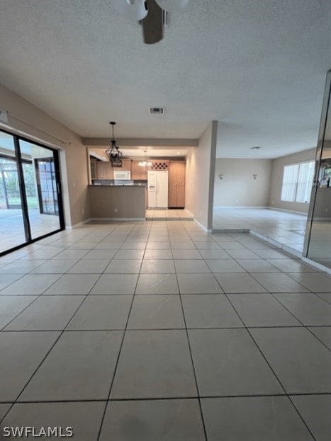 interior space featuring light tile floors