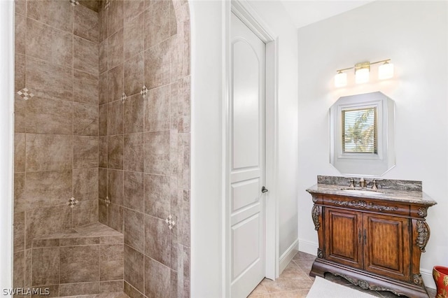 bathroom with vanity and tile floors