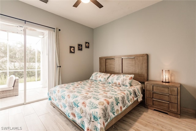 bedroom featuring light hardwood / wood-style floors, ceiling fan, and access to outside