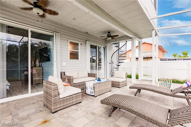 view of patio / terrace with ceiling fan and outdoor lounge area