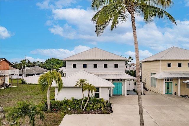 view of front facade with a front yard and a garage