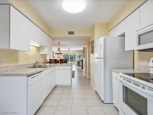 kitchen featuring white cabinetry, ceiling fan, white appliances, and sink