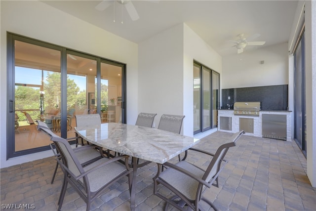 dining space featuring ceiling fan