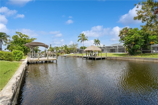 view of dock with a water view and a lanai